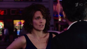 Movie still from “Date Night” (2010), directed by Shawn Levy – A person wearing a dress; Close Up shot, Over the shoulder angle