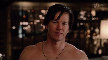 Movie still from “Date Night” (2010), directed by Shawn Levy – A man with no shirt is smiling for the camera; Close Up shot, Over the shoulder angle