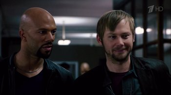 Movie still from “Date Night” (2010), directed by Shawn Levy – A couple of men standing next to each other; Close Up shot, Over the shoulder angle