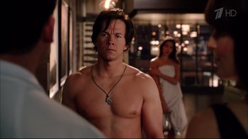 Movie still from “Date Night” (2010), directed by Shawn Levy – A man with no shirt standing in front of a woman; Medium shot, Over the shoulder angle