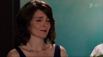 Movie still from “Date Night” (2010), directed by Shawn Levy – A person with her eyes closed; Close Up shot, Over the shoulder angle