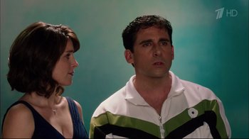 Movie still from “Date Night” (2010), directed by Shawn Levy – A man and a woman standing next to each other; Medium shot, Over the shoulder angle