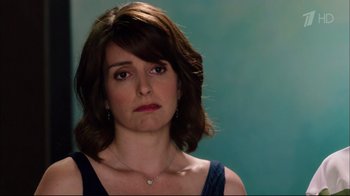 Movie still from “Date Night” (2010), directed by Shawn Levy – A person wearing a necklace; Close Up shot, Over the shoulder angle