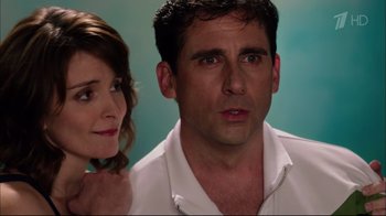 Movie still from “Date Night” (2010), directed by Shawn Levy – A man and a woman standing next to each other; Close Up shot, Over the shoulder angle