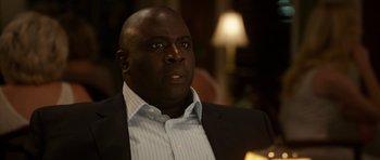 Movie still from “The Internship” (2013), directed by Shawn Levy – A person wearing a suit and tie; Close Up shot, High angle