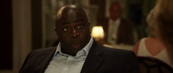 Movie still from “The Internship” (2013), directed by Shawn Levy – A person wearing a suit and tie; Close Up shot, Low angle