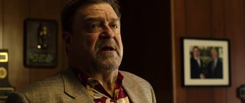 Movie still from “The Internship” (2013), directed by Shawn Levy – An older man with a beard wearing a jacket; Close Up shot, Low angle