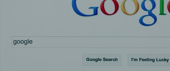 Movie still from “The Internship” (2013), directed by Shawn Levy – A computer screen showing the google search page; Extreme Close Up shot, High angle