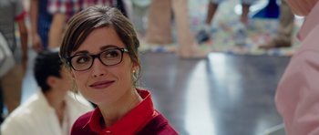 Movie still from “The Internship” (2013), directed by Shawn Levy – A person wearing glasses and a red shirt; Close Up shot, Over the shoulder angle
