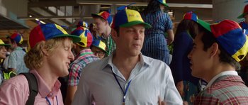 Movie still from “The Internship” (2013), directed by Shawn Levy – A group of people wearing colorful hats and standing around; Close Up shot, Over the shoulder angle