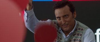 Movie still from “The Internship” (2013), directed by Shawn Levy – A person waving at the camera; Close Up shot, Over the shoulder angle