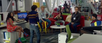 Movie still from “The Internship” (2013), directed by Shawn Levy – A group of young people sitting around a room; Wide shot, Over the shoulder angle