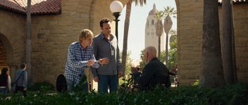 Movie still from “The Internship” (2013), directed by Shawn Levy – A group of people standing next to each other on a sidewalk; Wide shot, Over the shoulder angle