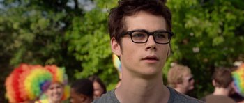 Movie still from “The Internship” (2013), directed by Shawn Levy – A young man wearing glasses and a gray shirt; Close Up shot, Over the shoulder angle