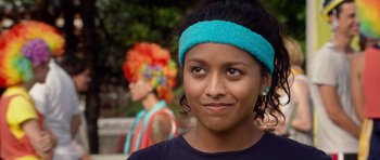 Movie still from “The Internship” (2013), directed by Shawn Levy – A woman wearing a blue head band and smiling; Close Up shot, Over the shoulder angle