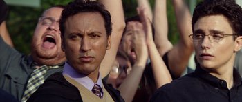 Movie still from “The Internship” (2013), directed by Shawn Levy – A person wearing a suit and tie; Close Up shot, Over the shoulder angle
