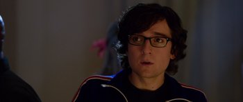 Movie still from “The Internship” (2013), directed by Shawn Levy – A man with glasses is looking at the camera; Close Up shot, Over the shoulder angle