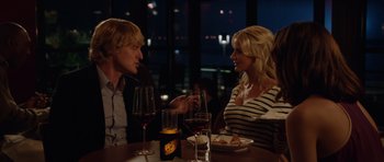 Movie still from “The Internship” (2013), directed by Shawn Levy – A man and a woman sitting at a dinner table; Medium shot, Over the shoulder angle