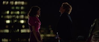 Movie still from “The Internship” (2013), directed by Shawn Levy – A man and a woman standing next to each other in the dark; Medium shot, Over the shoulder angle