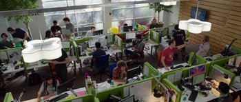 Movie still from “The Internship” (2013), directed by Shawn Levy – A group of people sitting at computers in an office setting; Wide shot, High angle