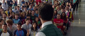 Movie still from “The Internship” (2013), directed by Shawn Levy – A group of people sitting in front of an audience; Medium shot, Over the shoulder angle