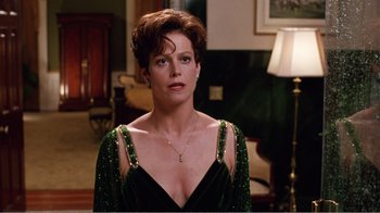 Movie still from “Dave” (1993), directed by Ivan Reitman – A person wearing a dress; Close Up shot, Low angle