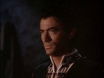 Movie still from “David and Bathsheba” (1951), directed by Henry King – A person wearing a suit and tie; Close Up shot, Low angle
