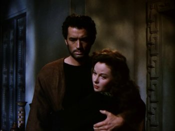 Movie still from “David and Bathsheba” (1951), directed by Henry King – A man and a woman standing next to each other; Medium shot, High angle