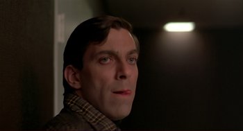 Movie still from “Dawn of the Dead” (1978), directed by George A. Romero – A person wearing a jacket; Close Up shot, Low angle