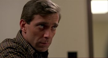 Movie still from “Dawn of the Dead” (1978), directed by George A. Romero – A person looking at the camera; Close Up shot, Low angle