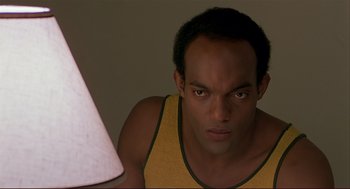 Movie still from “Dawn of the Dead” (1978), directed by George A. Romero – A person looking at the camera; Close Up shot, Low angle