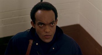 Movie still from “Dawn of the Dead” (1978), directed by George A. Romero – A person wearing a jacket; Close Up shot, High angle