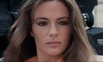 Movie still from “Day for Night” (1973), directed by François Truffaut – A woman's face with long brown hair; Close Up shot, High angle