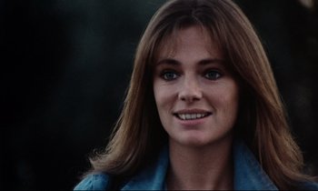 Movie still from “Day for Night” (1973), directed by François Truffaut – A person with long hair; Close Up shot, Over the shoulder angle