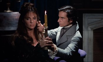 Movie still from “Day for Night” (1973), directed by François Truffaut – A man and a woman are holding a candle; Medium shot, Over the shoulder angle
