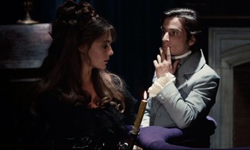 Movie still from “Day for Night” (1973), directed by François Truffaut – A man and a woman are sitting in front of each other; Medium shot, Over the shoulder angle