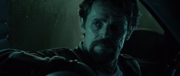 Movie still from “Daybreakers” (2009), directed by Michael Spierig – A person with a beard; Close Up shot, Over the shoulder angle