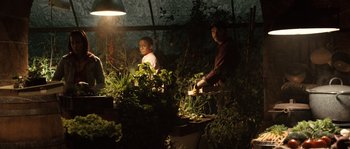 Movie still from “Daybreakers” (2009), directed by Michael Spierig – Two men standing next to each other in the dark; Medium shot, Over the shoulder angle