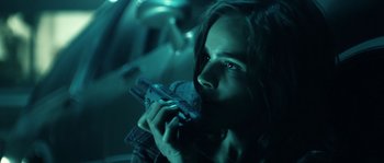 Movie still from “Daybreakers” (2009), directed by Michael Spierig – A woman holding a gun in her hands; Close Up shot, Low angle