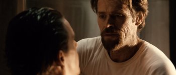 Movie still from “Daybreakers” (2009), directed by Michael Spierig – A man and a woman looking at each other in a mirror; Close Up shot, Over the shoulder angle