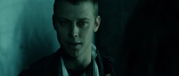 Movie still from “Daybreakers” (2009), directed by Michael Spierig – A person wearing a jacket; Close Up shot, Low angle