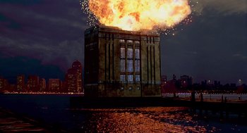 Movie still from “Daylight” (1996), directed by Rob Cohen – A building that is on fire in the middle of the night; Extreme Wide shot, Low angle