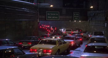 Movie still from “Daylight” (1996), directed by Rob Cohen – A bunch of cars that are in the street; Extreme Wide shot, High angle