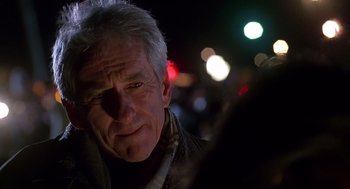 Movie still from “Daylight” (1996), directed by Rob Cohen – An older man is looking into the camera; Close Up shot, Low angle