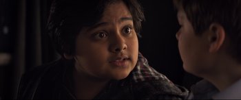 Movie still from “The Kid Who Would Be King” (2019), directed by Joe Cornish – A person looking at the camera; Close Up shot, High angle