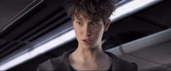 Movie still from “The Kid Who Would Be King” (2019), directed by Joe Cornish – A person with green eyes; Close Up shot, Low angle