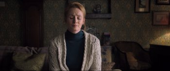 Movie still from “The Kid Who Would Be King” (2019), directed by Joe Cornish – A woman in a blue shirt and a white sweater; Medium shot, Over the shoulder angle