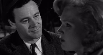 Movie still from “Days of Wine and Roses” (1962), directed by Blake Edwards – A man and a woman talking to each other; Close Up shot, Low angle