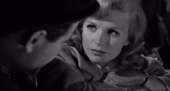 Movie still from “Days of Wine and Roses” (1962), directed by Blake Edwards – A black - and - white photo of a woman and a man; Close Up shot, Over the shoulder angle