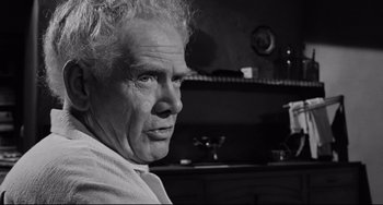 Movie still from “Days of Wine and Roses” (1962), directed by Blake Edwards – An older man is looking into the distance; Close Up shot, Low angle